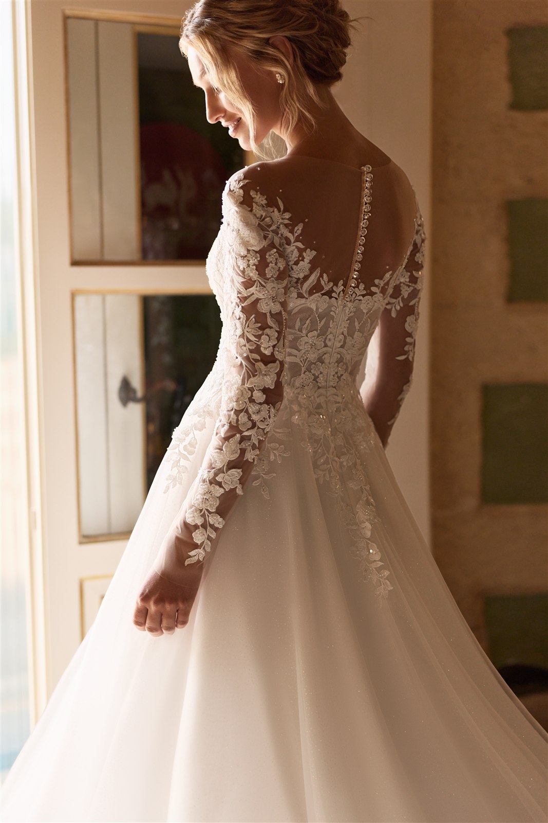 Brautkleid mit langen Ärmeln für eine Herbsthochzeit